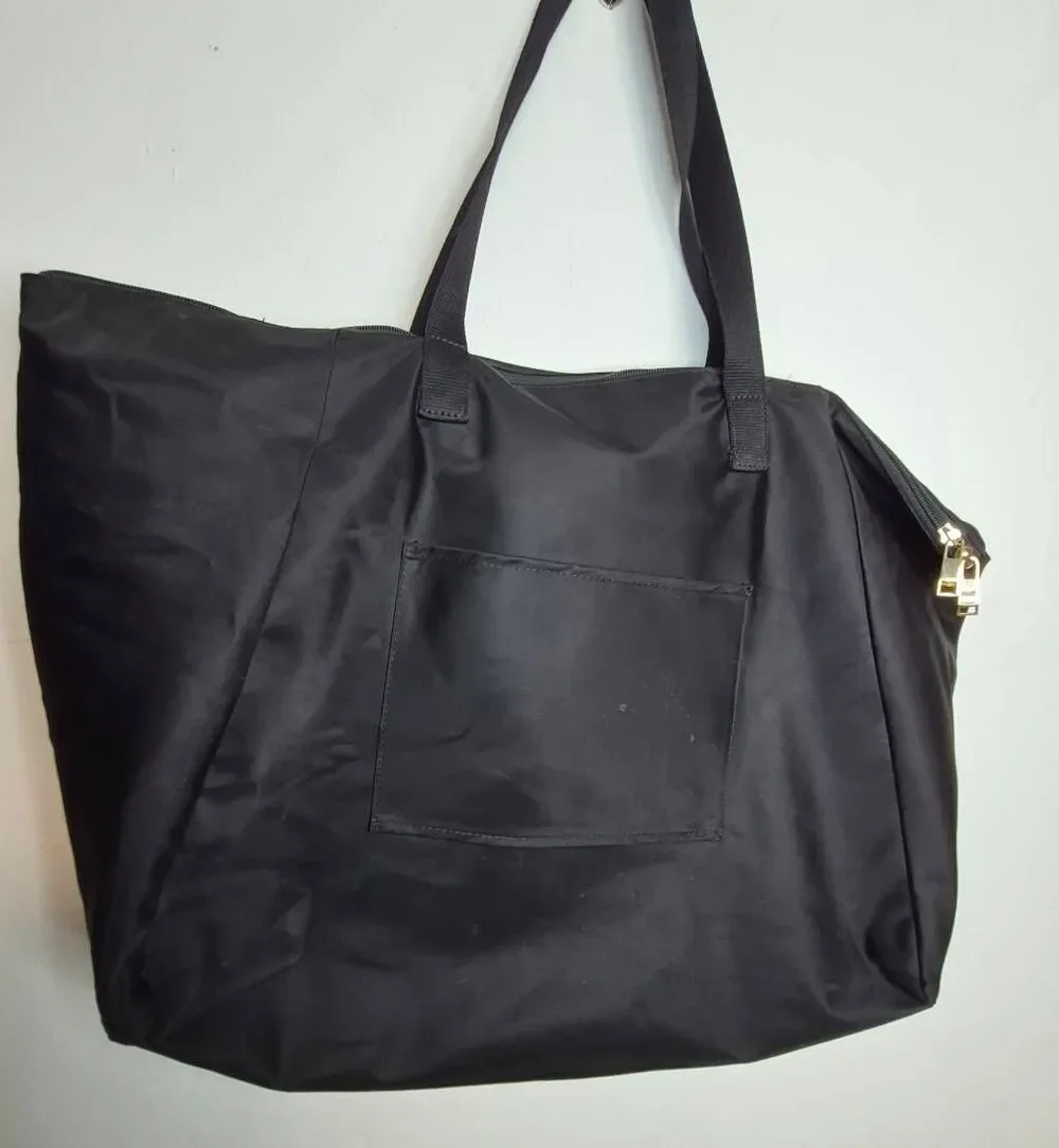 Tumi Voyager tote